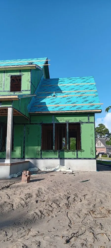 Slide of Benton's Roofing & Remodeling