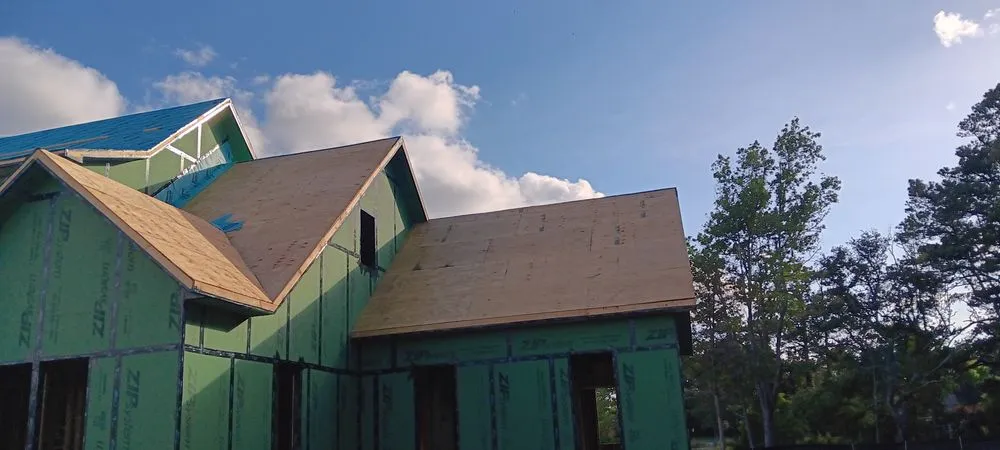 Slide of Benton's Roofing & Remodeling