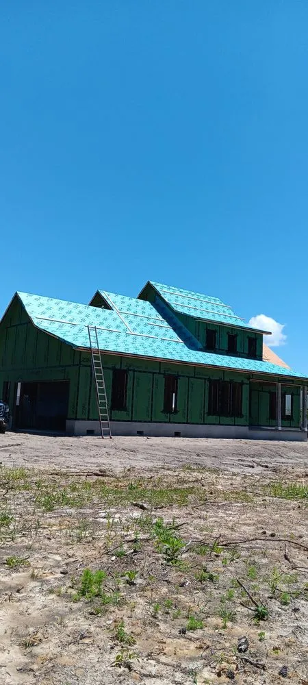 Slide of Benton's Roofing & Remodeling