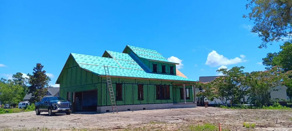 Slide of Benton's Roofing & Remodeling