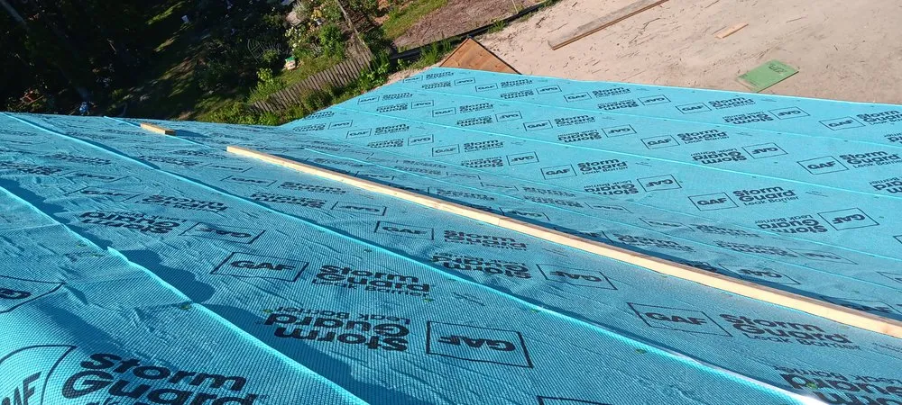 Slide of Benton's Roofing & Remodeling