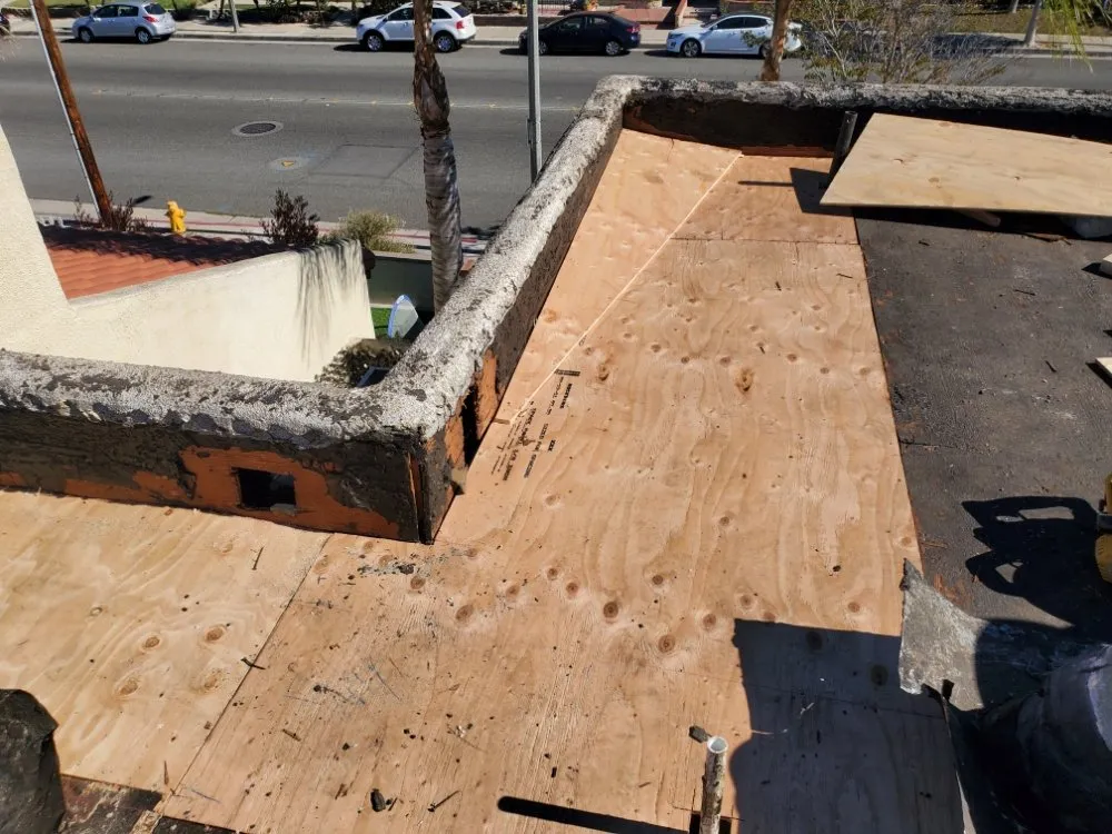 Slide of Berber-Bravo Roofing