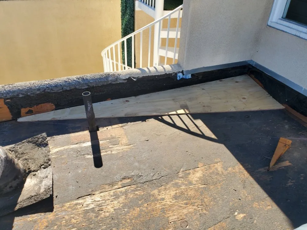 Slide of Berber-Bravo Roofing