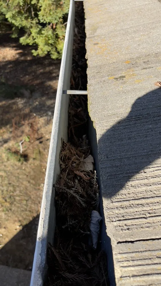 Slide of Berlins Roofing & Gutters