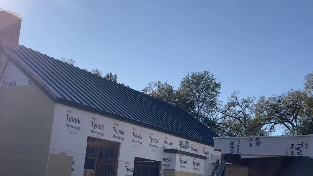 Slide of Berlins Roofing & Gutters