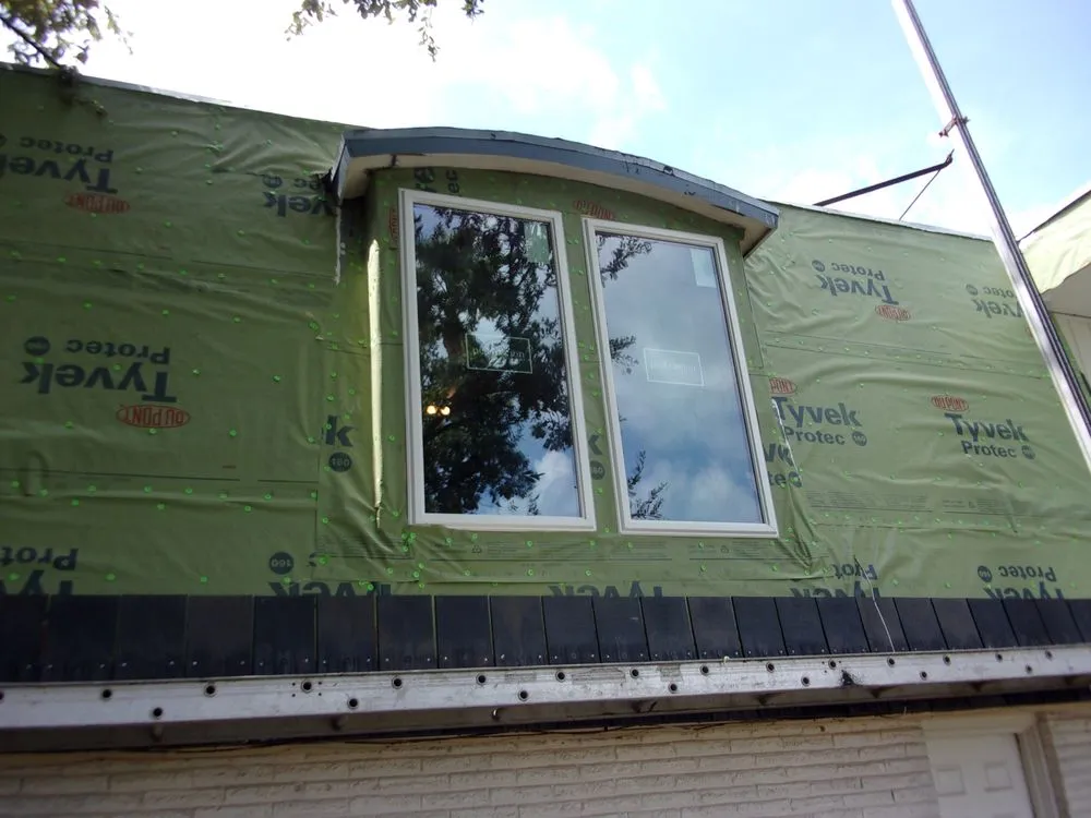 Slide of Berryman Roofing