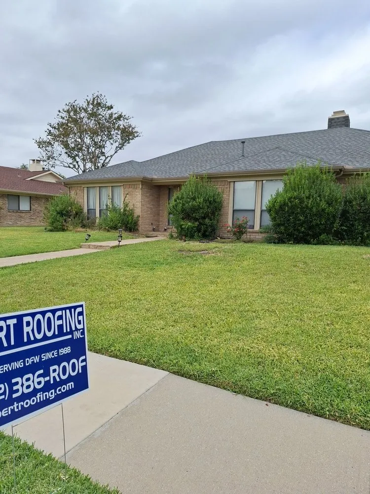 Slide of Bert Roofing