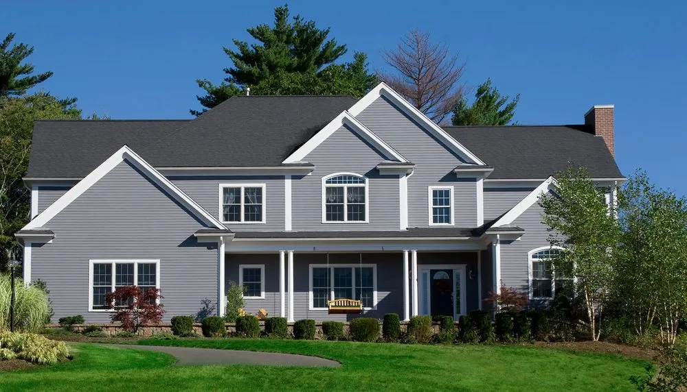 Slide of Bert Roofing