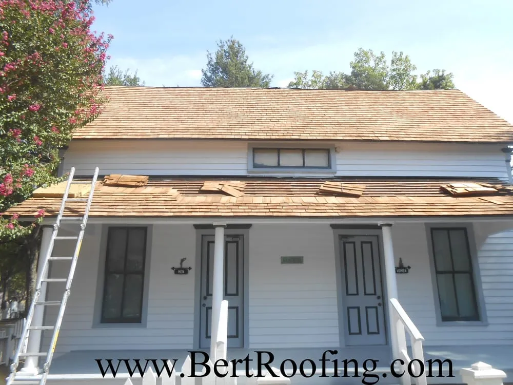 Slide of Bert Roofing