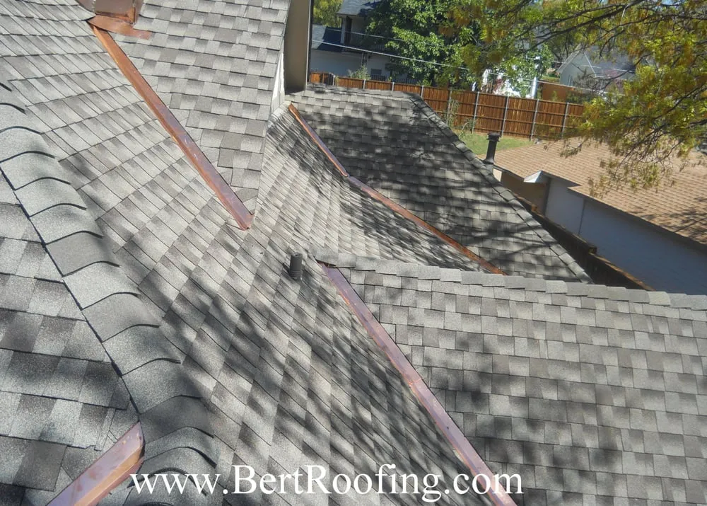 Slide of Bert Roofing