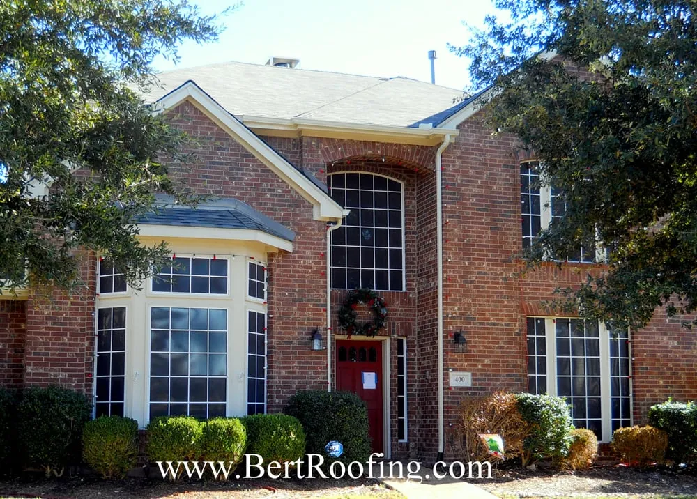 Slide of Bert Roofing