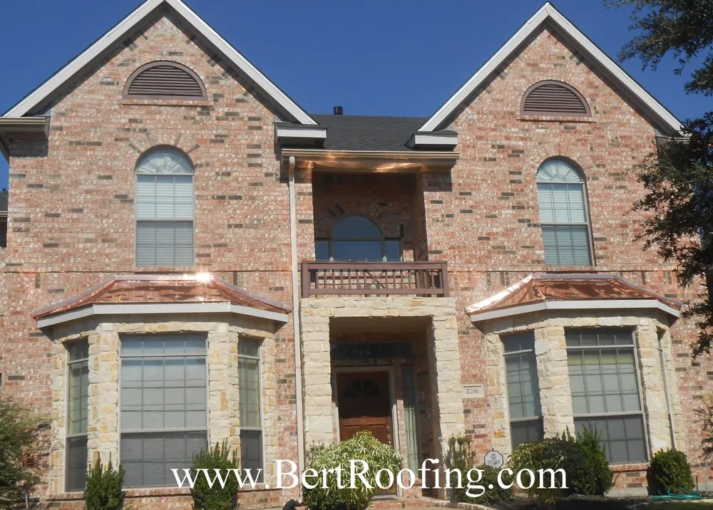 Slide of Bert Roofing