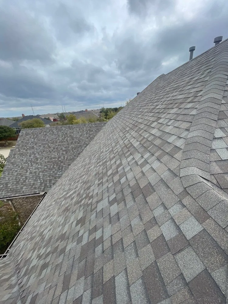 Slide of Bert Roofing