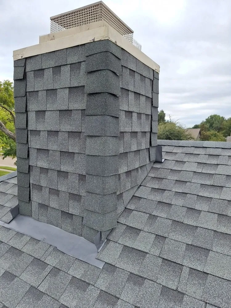 Slide of Bert Roofing