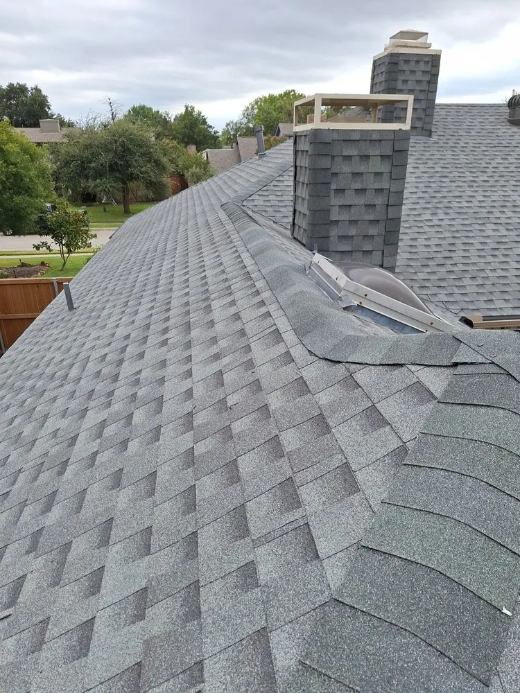 Slide of Bert Roofing