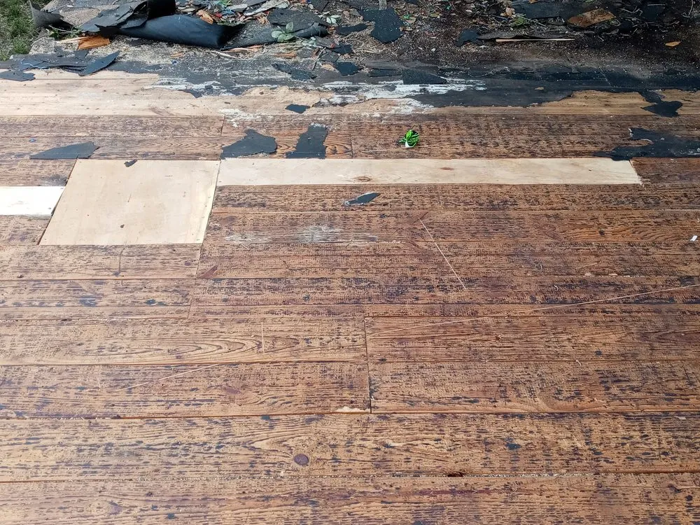 Slide of Bert's Roofing