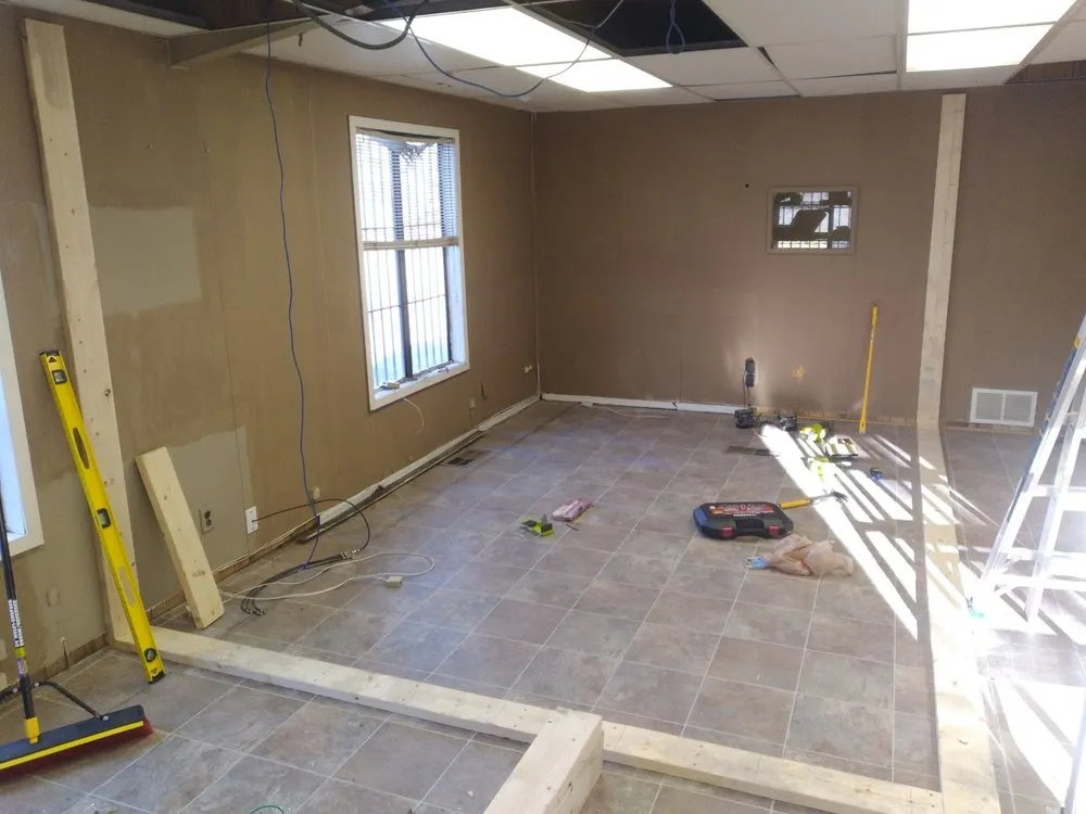 Slide of Bert's Roofing