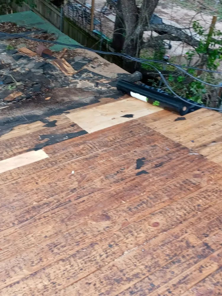 Slide of Bert's Roofing