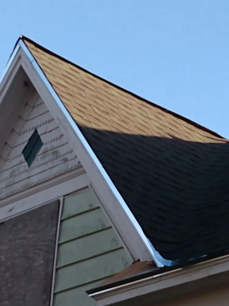 Slide of Bert's Roofing