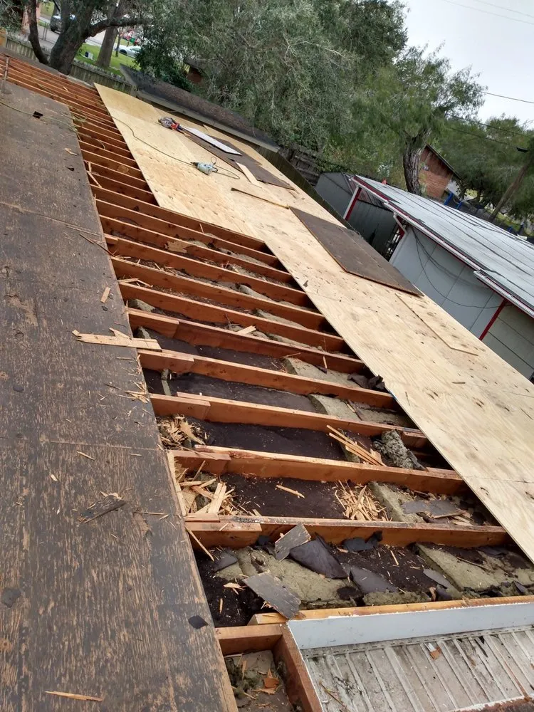 Slide of Bert's Roofing