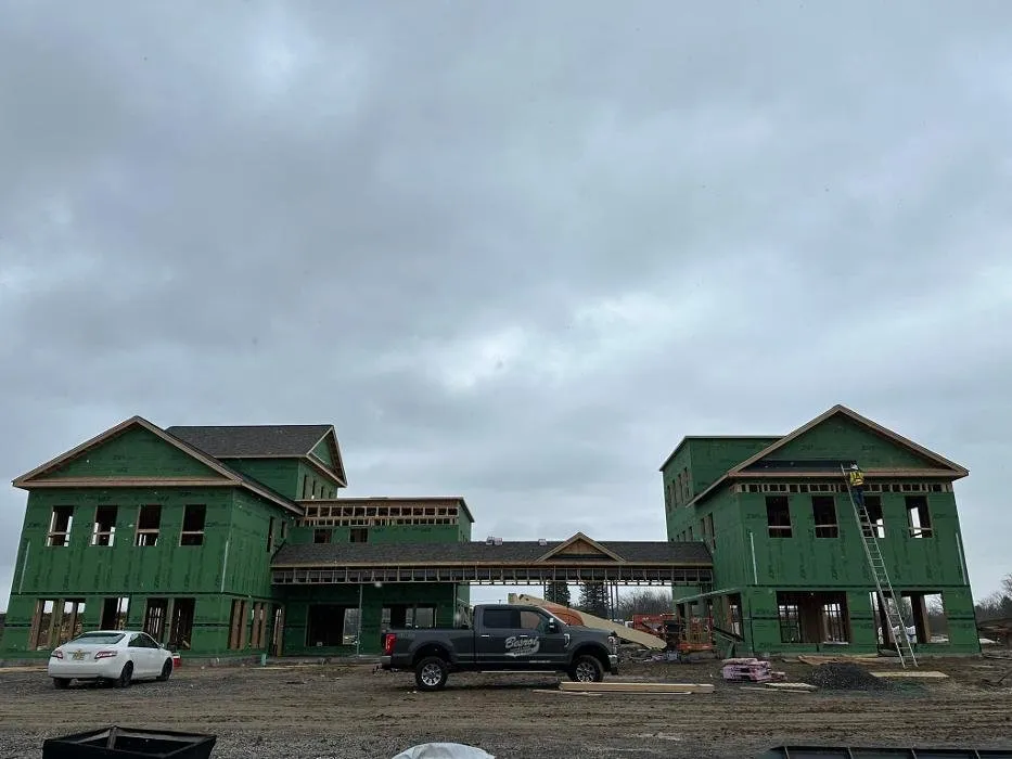 Slide of Besroi Roofing & Siding