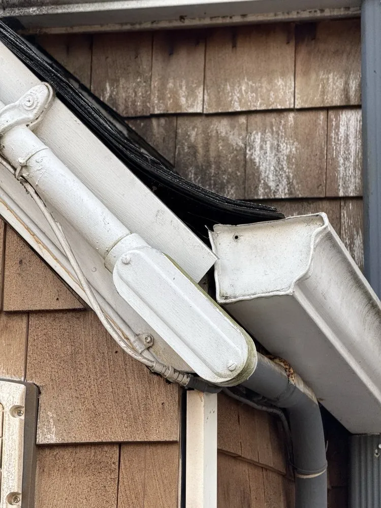 Slide of Best American Roofing