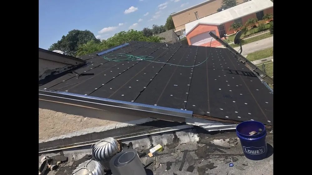 Slide of Best Roofing Company