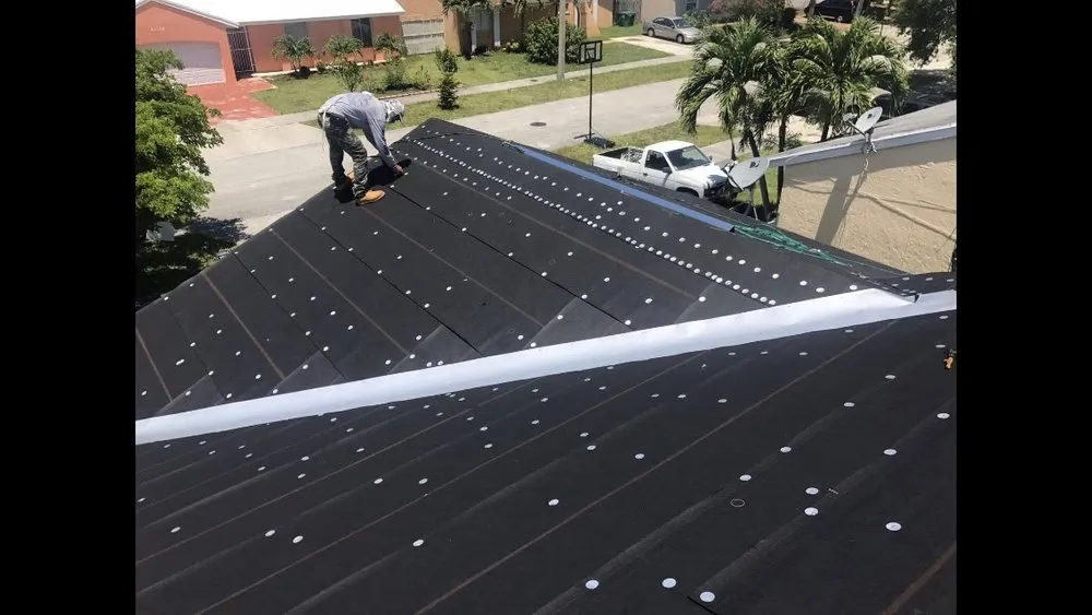 Slide of Best Roofing Company