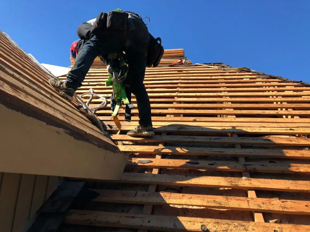 Slide of Best Roofing Company