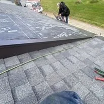 Slide of Big Al's Roofing