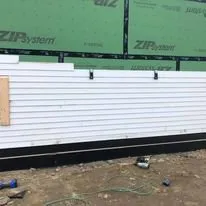 Slide of Big Al's Roofing