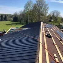 Slide of Big Al's Roofing