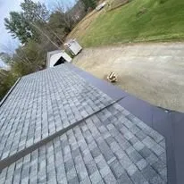 Slide of Big Al's Roofing