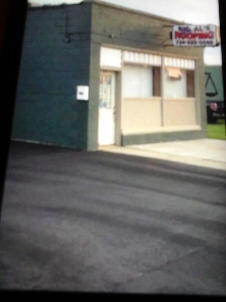 Slide of Big Al's Roofing