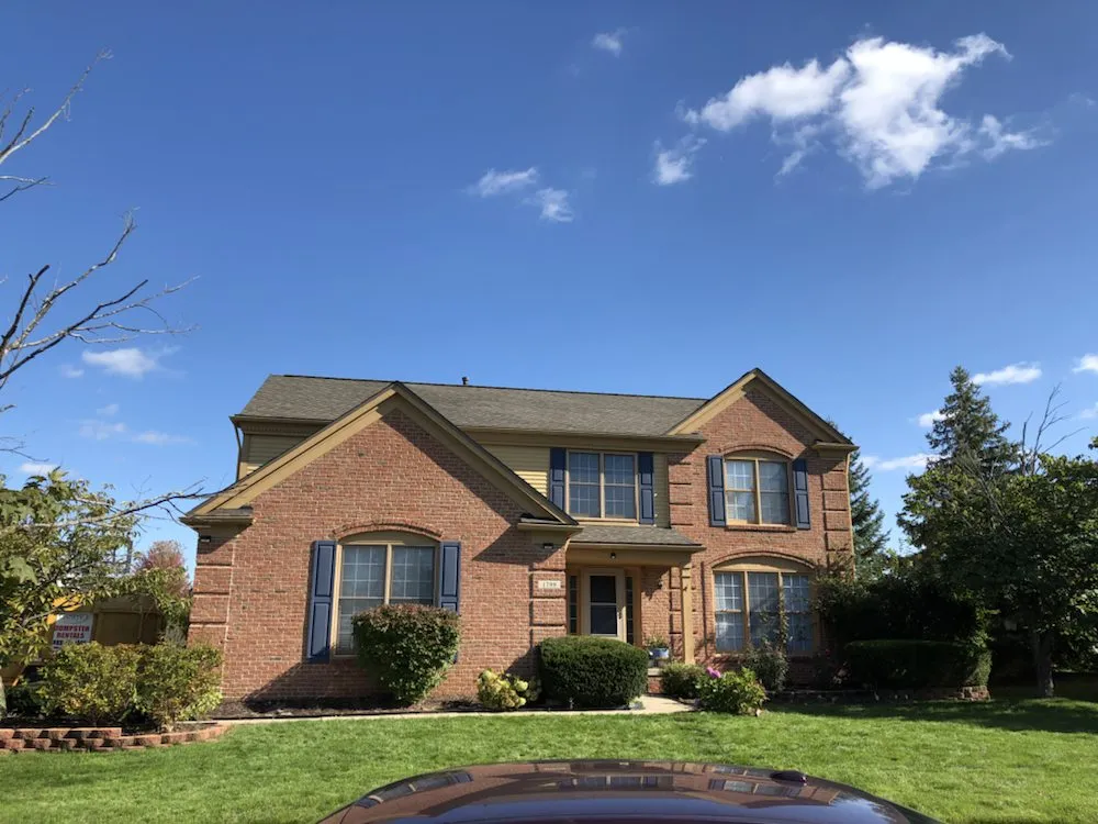 Slide of Big Al's Roofing