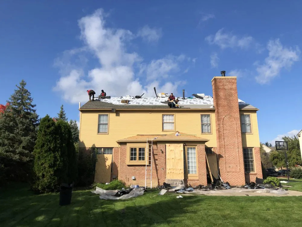 Slide of Big Al's Roofing