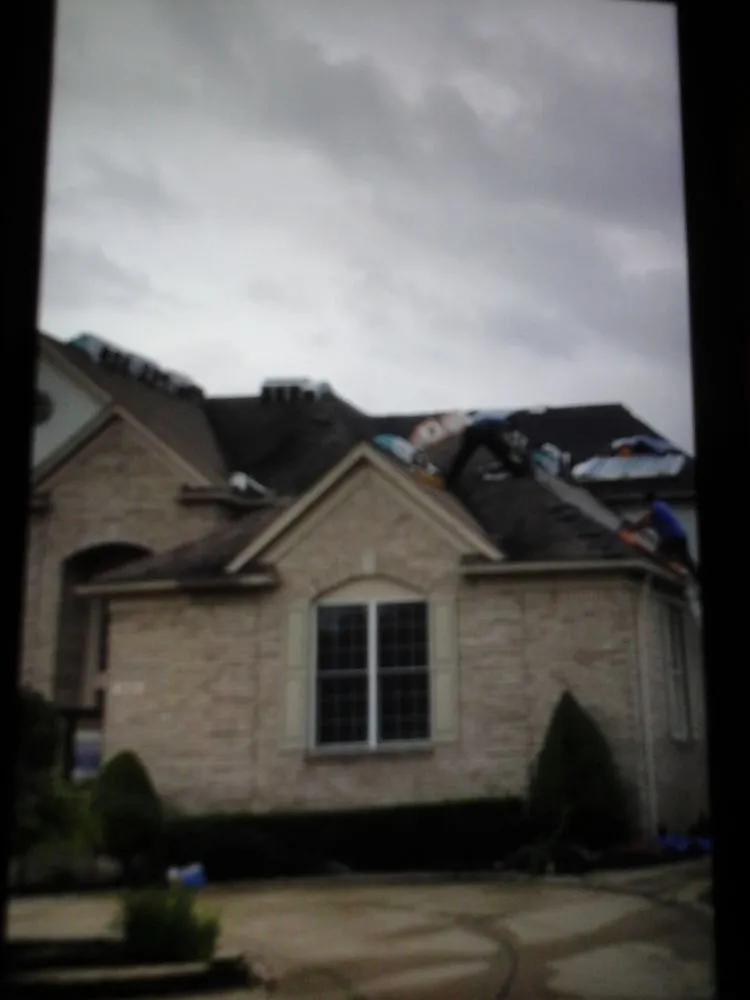 Slide of Big Al's Roofing