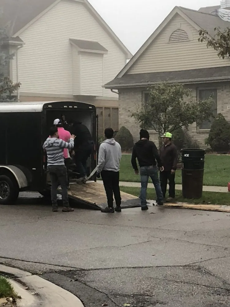 Slide of Big Al's Roofing