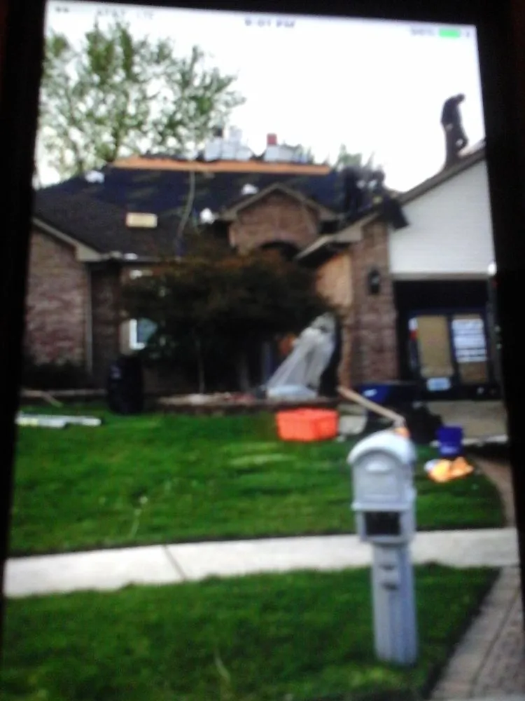 Slide of Big Al's Roofing