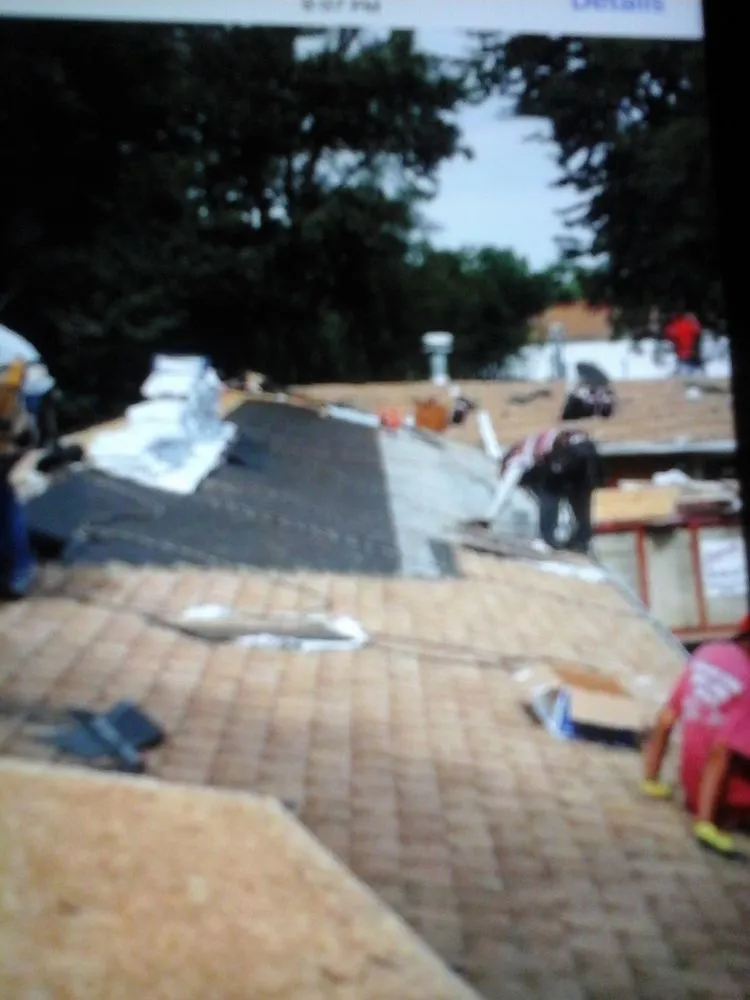 Slide of Big Al's Roofing