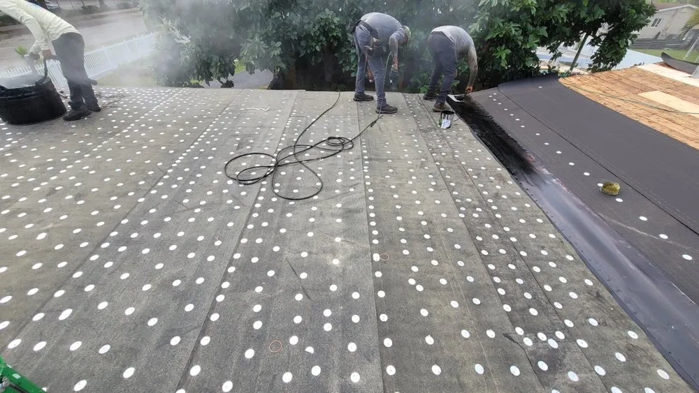 Slide of Big Al's Roofing