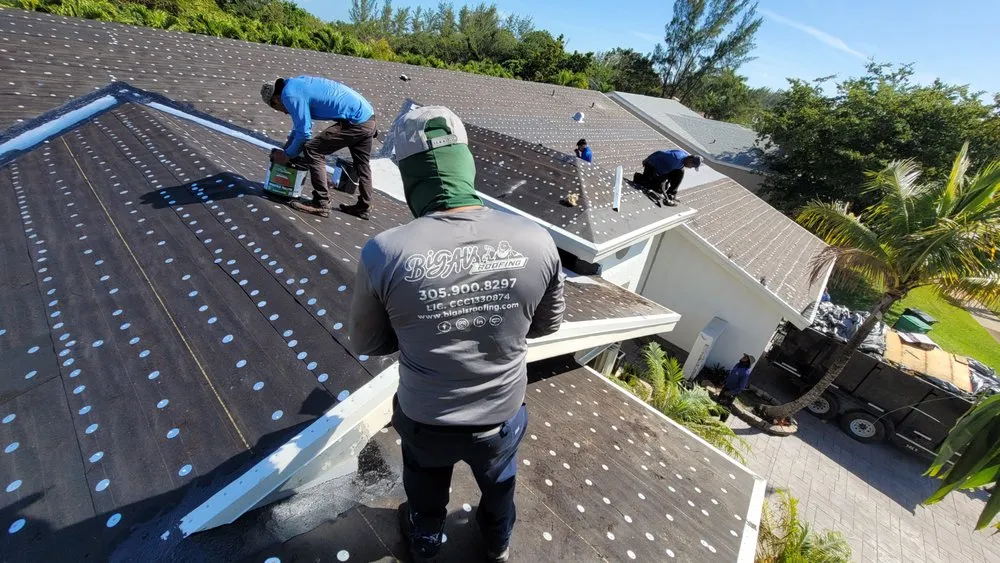 Slide of Big Al's Roofing