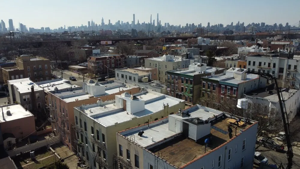 Slide of Big Apple Renovators - Astoria