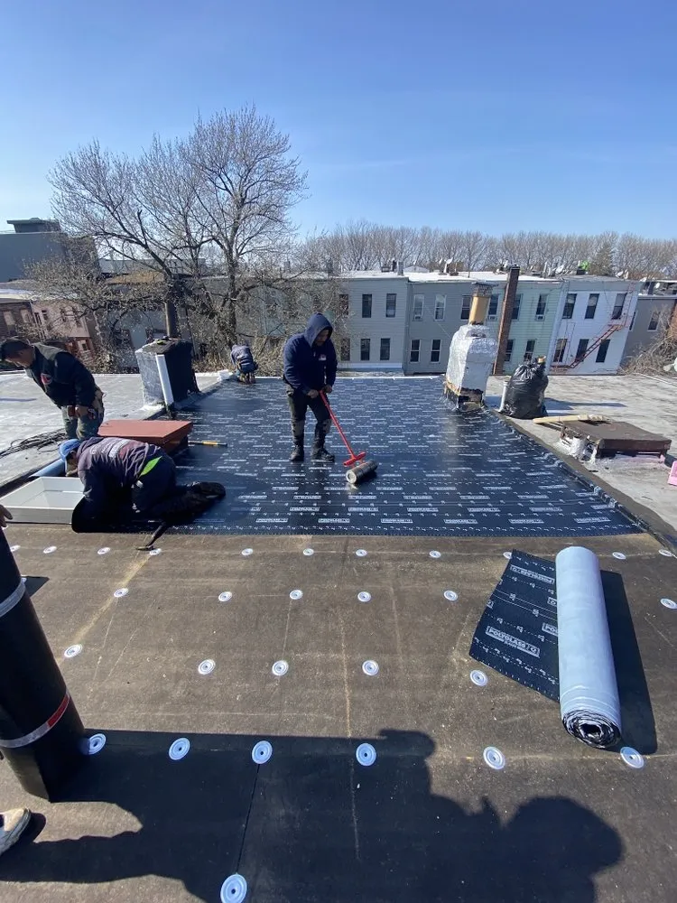 Slide of Big Apple Renovators - Astoria