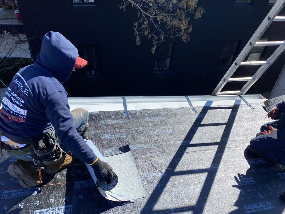 Slide of Big Apple Renovators - Astoria