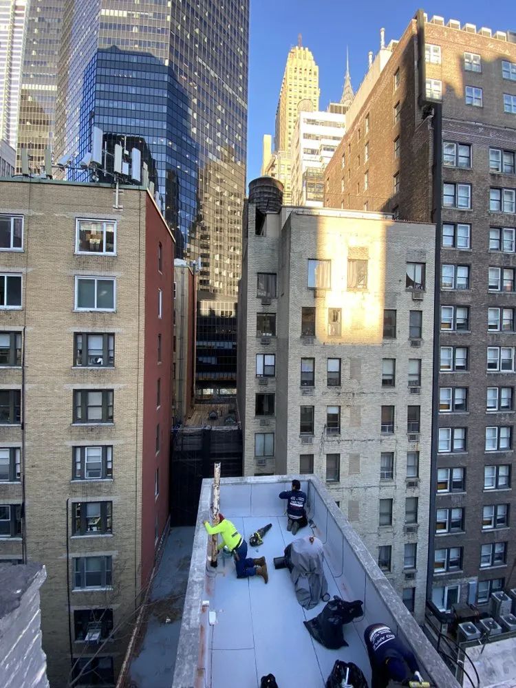 Slide of Big Apple Renovators - Astoria