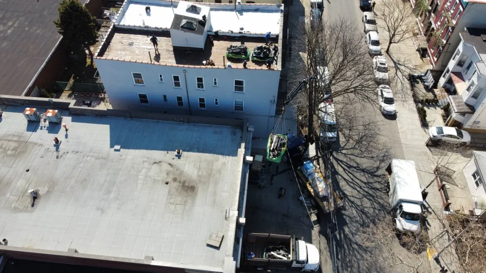 Slide of Big Apple Renovators - Astoria