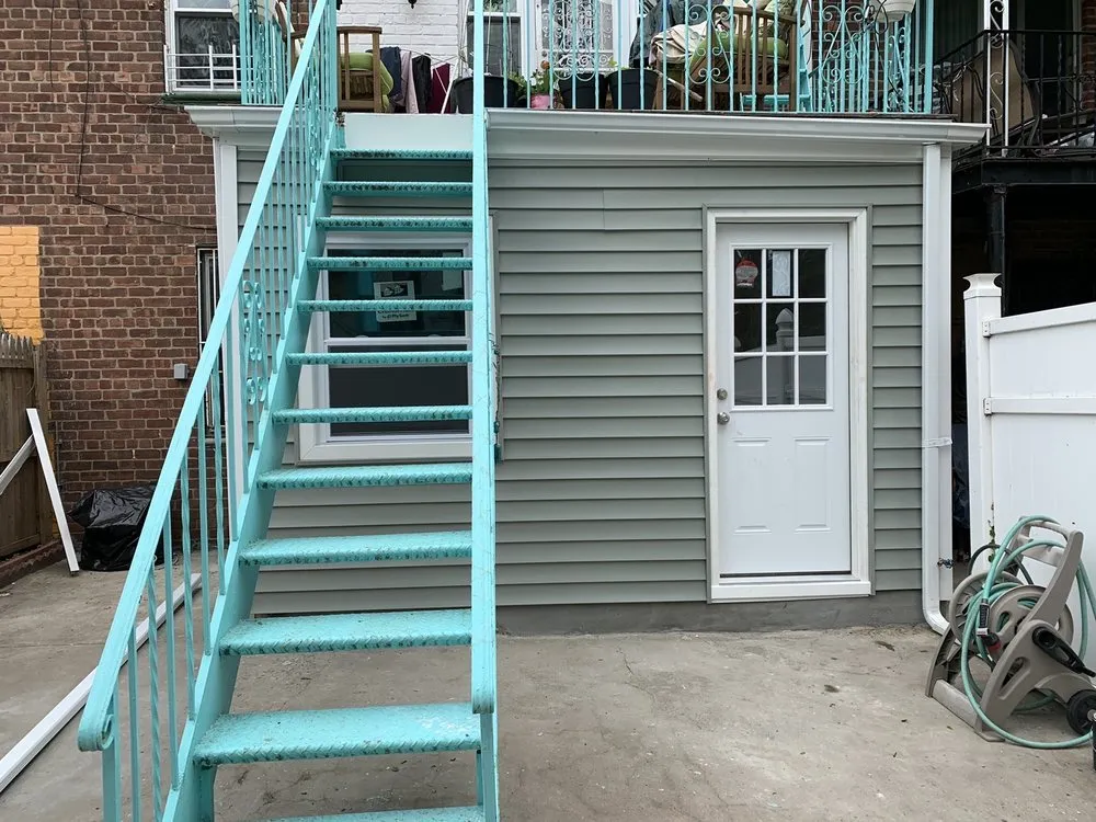 Slide of Big Apple Renovators - Queens