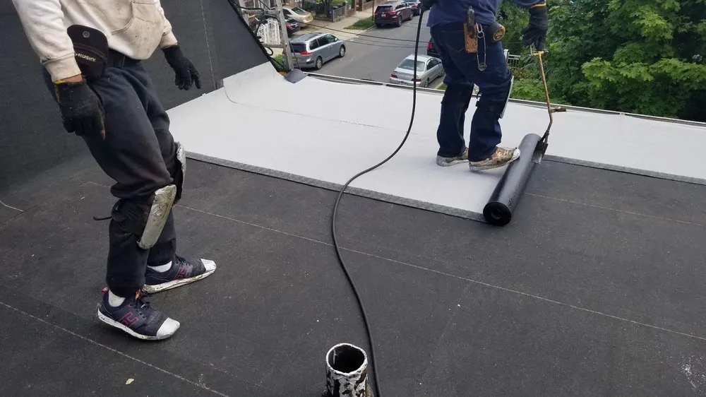 Slide of Big Apple Renovators - Queens