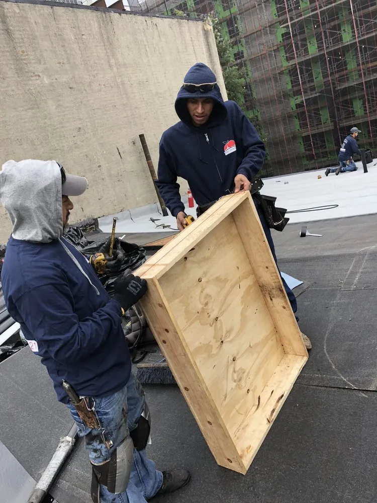 Slide of Big Apple Renovators - Queens